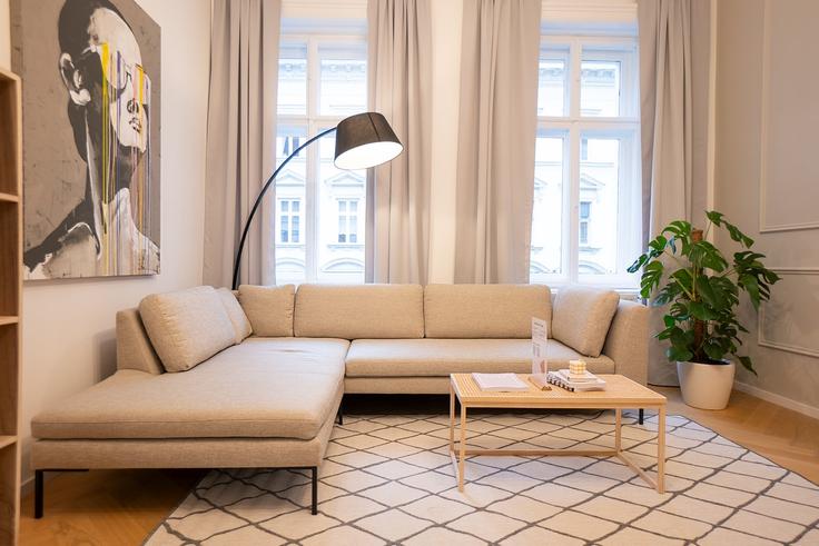 Elegante sala de estar con mobiliario moderno en un apartamento en Building Hörlgasse 5 - bosu-gmbh - 1500318 en Vienna, Vienna Elegante sala de estar con mobiliario moderno en un apartamento en Building Hörlgasse 5 - bosu-gmbh - 1500318 en Vienna, Vienna