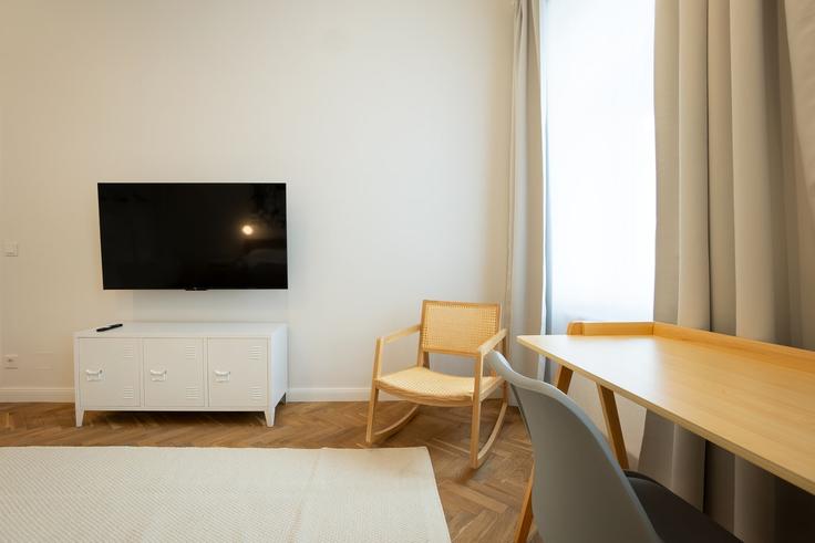 Salle de séjour élégante avec mobilier moderne dans un appartement à Building Urban-Loritz-Platz 5 - bosu-gmbh - 1500314 à Vienna, Vienna Salle de séjour élégante avec mobilier moderne dans un appartement à Building Urban-Loritz-Platz 5 - bosu-gmbh - 1500314 à Vienna, Vienna