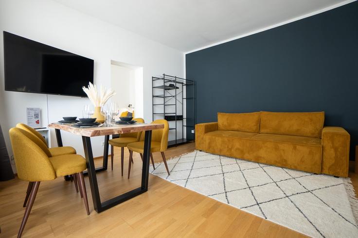 Vienna, Vienna에 위치한 Building Kolonitzgasse 2 - bosu-gmbh - 1500326 유닛의 세련된 인테리어가 돋보이는 거실 Vienna, Vienna에 위치한 Building Kolonitzgasse 2 - bosu-gmbh - 1500326 유닛의 세련된 인테리어가 돋보이는 거실