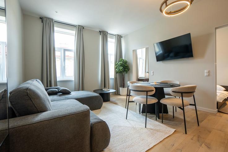 Salle de séjour élégante avec mobilier moderne dans un appartement à Building Schallergasse 38 - bosu-gmbh - 1594594 à Vienna, Vienna Salle de séjour élégante avec mobilier moderne dans un appartement à Building Schallergasse 38 - bosu-gmbh - 1594594 à Vienna, Vienna