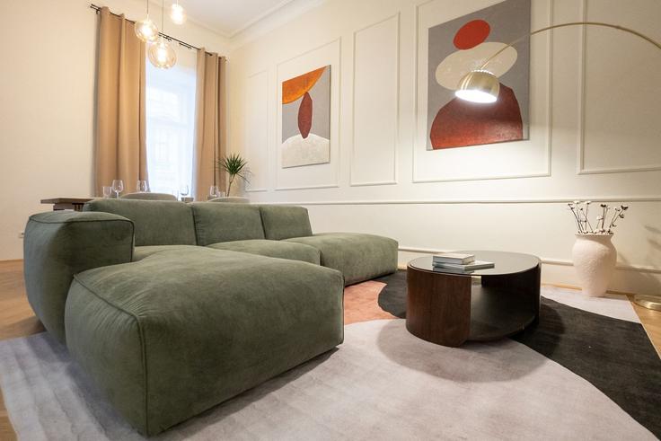 Sala de estar elegantemente projetada com móveis modernos em um apartamento no Building Schmerlingplatz 3 - bosu-gmbh - 1500340 em Vienna, Vienna Sala de estar elegantemente projetada com móveis modernos em um apartamento no Building Schmerlingplatz 3 - bosu-gmbh - 1500340 em Vienna, Vienna