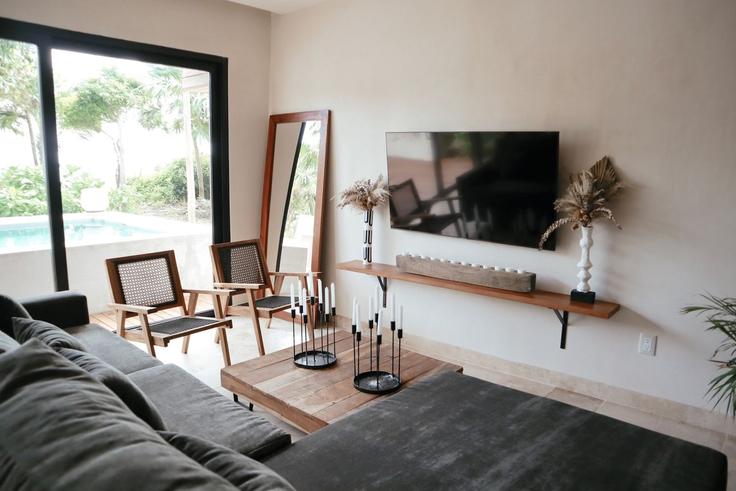 Building Tankah 3 M-3 L-49 50 - bt-homes - 1500825 adresindeki bir dairede modern mobilyalarla zarif bir şekilde tasarlanmış oturma odası Dreams Tulum, Dreams Tulum