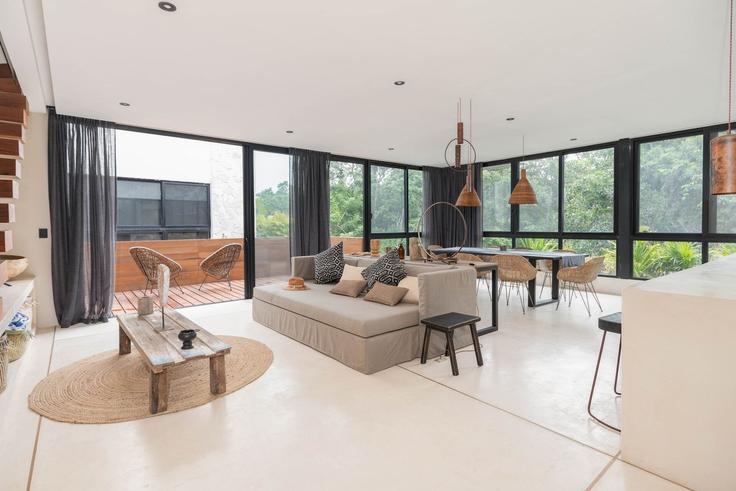 Tulum TulumのBuilding Aldea Zama - bt-homes - 1647139のアパートメントにある、モダンな家具を備えたエレガントなデザインのリビングルーム