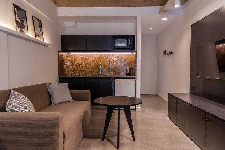 Buenos Aires, Buenos Aires에 위치한 Building Rodríguez Peña - bt-homes - 1500942 유닛의 세련된 인테리어가 돋보이는 거실 Buenos Aires, Buenos Aires에 위치한 Building Rodríguez Peña - bt-homes - 1500942 유닛의 세련된 인테리어가 돋보이는 거실
