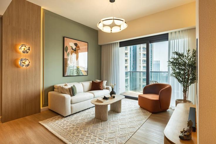 Elegante sala de estar con mobiliario moderno en un apartamento en Building Sheikh Mohammed bin Rashid Boulevard - caabi-boutique-homes - 1590450 en Burj Khalifa, Dubai Elegante sala de estar con mobiliario moderno en un apartamento en Building Sheikh Mohammed bin Rashid Boulevard - caabi-boutique-homes - 1590450 en Burj Khalifa, Dubai