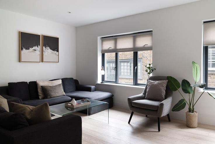 Salle de séjour élégante avec mobilier moderne dans un appartement à Building Bourlet Close - calton-living-ltd-1 - 1514146 à City of Westminster, London Salle de séjour élégante avec mobilier moderne dans un appartement à Building Bourlet Close - calton-living-ltd-1 - 1514146 à City of Westminster, London