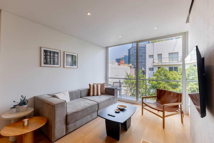 Mexico City, Mexico City에 위치한 Building Hamburgo - capitalia - 1292812 유닛의 세련된 인테리어가 돋보이는 거실