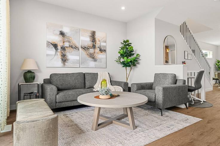 Elegante sala de estar con mobiliario moderno en un apartamento en Building 46 Starling Boulevard - casa-co-host-1 - 1698598 en Calgary, Calgary Elegante sala de estar con mobiliario moderno en un apartamento en Building 46 Starling Boulevard - casa-co-host-1 - 1698598 en Calgary, Calgary