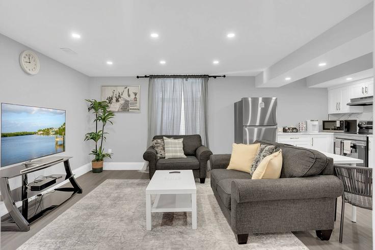 Elegantly designed living room with modern furnishings in an apartment at Building 8 sass crescent - casa-co-host-1 - 1698614 in Brant, Brant