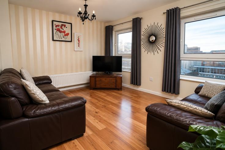 Salle de séjour élégante avec mobilier moderne dans un appartement à Building College Square North - cc-apartments - 1511061 à Belfast, Belfast