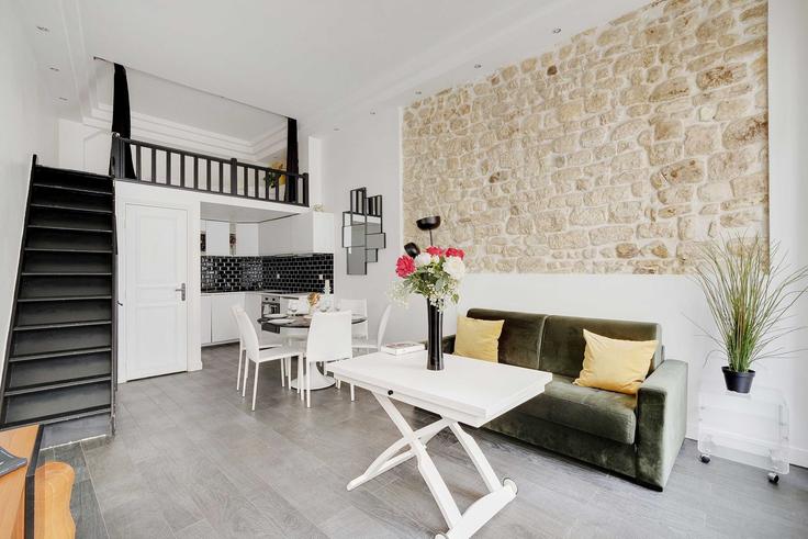 Salle de séjour élégante avec mobilier moderne dans un appartement à Building Rue de la Lune - checkmyguest - 1350191 à 2nd arrondissement, Paris Salle de séjour élégante avec mobilier moderne dans un appartement à Building Rue de la Lune - checkmyguest - 1350191 à 2nd arrondissement, Paris