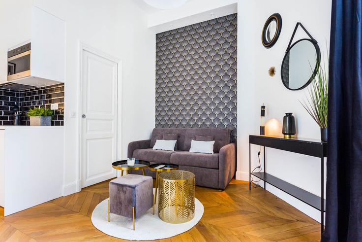 Elegantly designed living room with modern furnishings in an apartment at Building Avenue Paul Doumer - checkmyguest - 1350110 in 16th arrondissement, Paris