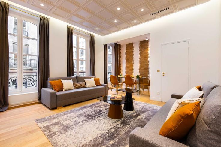 Paris 2nd arrondissementのBuilding Rue Feydeau - checkmyguest - 1350251のアパートメントにある、モダンな家具を備えたエレガントなデザインのリビングルーム