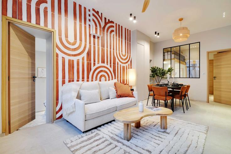 Salle de séjour élégante avec mobilier moderne dans un appartement à Building Passage Ramey - checkmyguest - 1350502 à 18th arrondissement, Paris