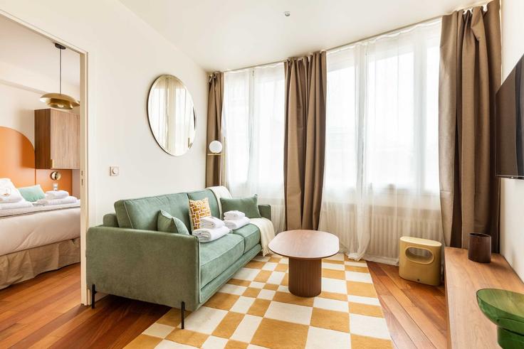 Salle de séjour élégante avec mobilier moderne dans un appartement à Building Rue des Reculettes - checkmyguest - 1348976 à 13th arrondissement, Paris