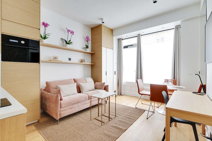 Paris 7th arrondissementのBuilding Rue Pierre Leroux - checkmyguest - 1348862のアパートメントにある、モダンな家具を備えたエレガントなデザインのリビングルーム