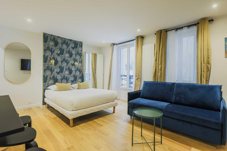 Salle de séjour élégante avec mobilier moderne dans un appartement à Building Rue Feutrier - checkmyguest - 1348696 à 18th arrondissement, Paris