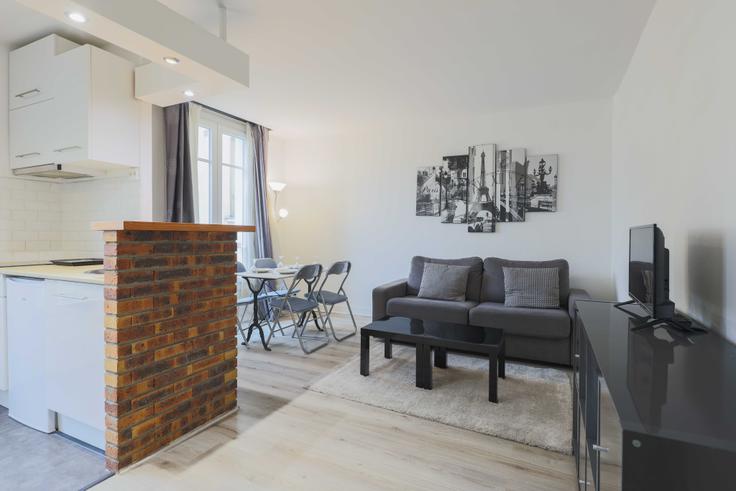Sala de estar elegantemente projetada com móveis modernos em um apartamento no Building Rue Cambronne - checkmyguest - 1223331 em 15th arrondissement, Paris