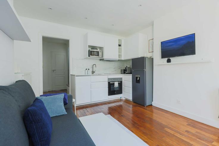 Salle de séjour élégante avec mobilier moderne dans un appartement à Building Rue Guillaume Tell - checkmyguest - 1223338 à 17th arrondissement, Paris Salle de séjour élégante avec mobilier moderne dans un appartement à Building Rue Guillaume Tell - checkmyguest - 1223338 à 17th arrondissement, Paris
