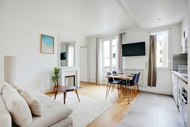 Sala de estar elegantemente projetada com móveis modernos em um apartamento no Building Rue de la Croix Nivert - checkmyguest - 1271257 - PAR em 15th arrondissement, Paris