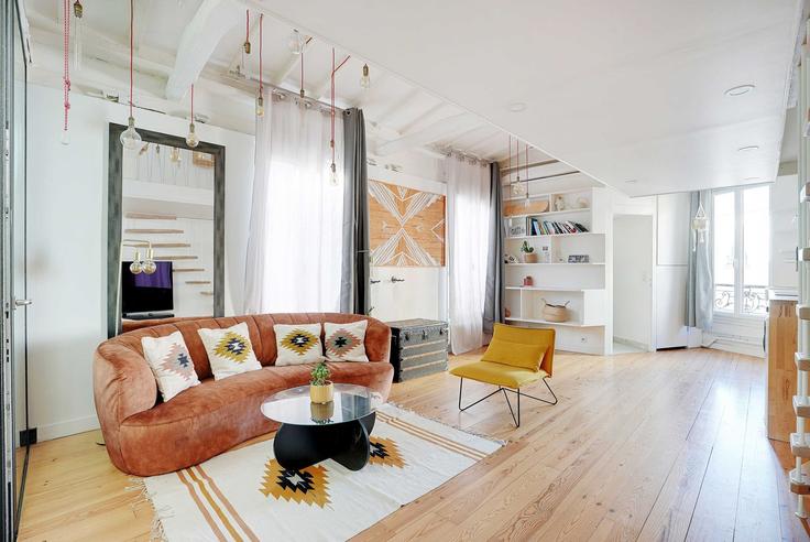 Elegantly designed living room with modern furnishings in an apartment at Building Rue de la Fontaine au Roi - checkmyguest - 1353130 in 11th arrondissement, Paris Elegantly designed living room with modern furnishings in an apartment at Building Rue de la Fontaine au Roi - checkmyguest - 1353130 in 11th arrondissement, Paris