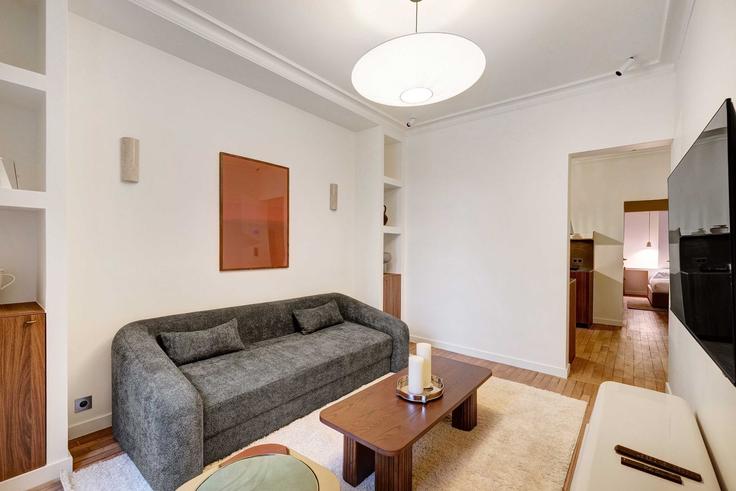 Salle de séjour élégante avec mobilier moderne dans un appartement à Building Rue Custine - checkmyguest - 1336792 à 18th arrondissement, Paris