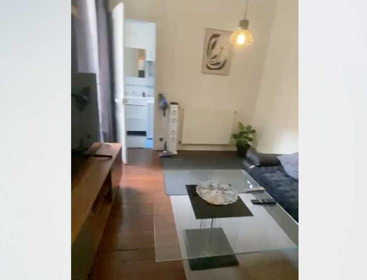 Salle de séjour élégante avec mobilier moderne dans un appartement à Building Rue du Printemps - checkmyguest - 1512338 à 17th arrondissement, Paris Salle de séjour élégante avec mobilier moderne dans un appartement à Building Rue du Printemps - checkmyguest - 1512338 à 17th arrondissement, Paris