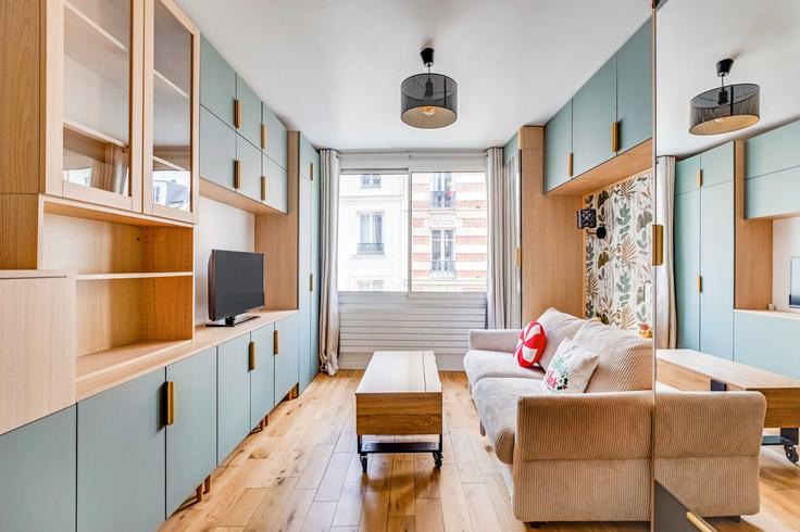 9th arrondissement, Paris에 위치한 Building Rue de Bellefond - checkmyguest - 1530428 유닛의 세련된 인테리어가 돋보이는 거실 9th arrondissement, Paris에 위치한 Building Rue de Bellefond - checkmyguest - 1530428 유닛의 세련된 인테리어가 돋보이는 거실