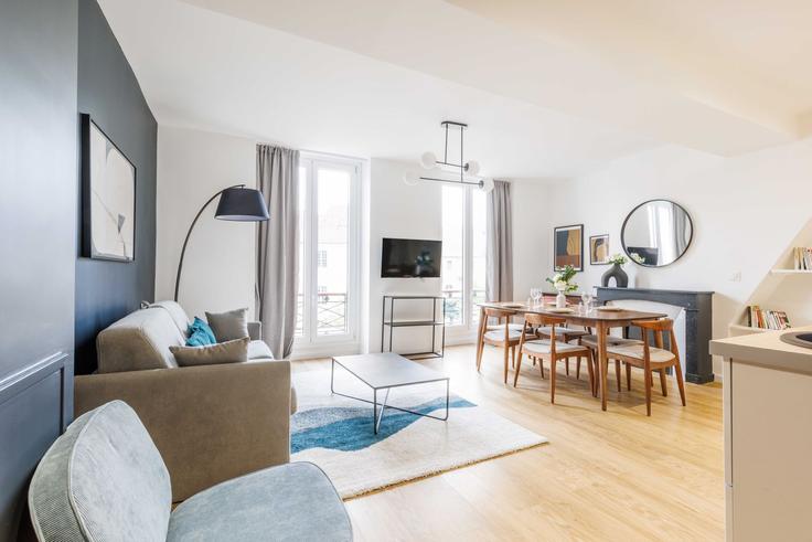 Elegante sala de estar con mobiliario moderno en un apartamento en Building Rue de Sèvres - checkmyguest - 1583808 en 6th arrondissement, Paris
