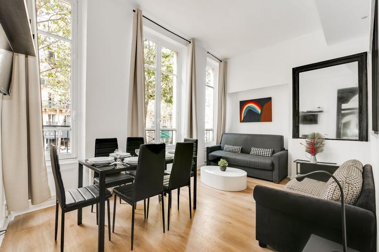 Elegantly designed living room with modern furnishings in an apartment at Building Boulevard Saint-Germain - checkmyguest - 1350960 in 6th arrondissement, Paris
