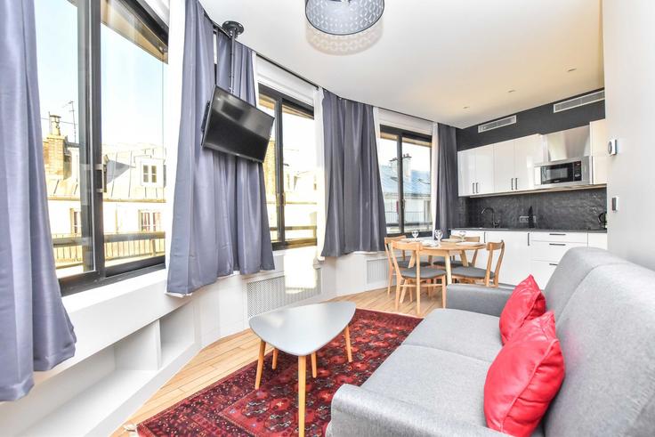 Elegantly designed living room with modern furnishings in an apartment at Building Rue du Helder - checkmyguest - 1350214 in 9th arrondissement, Paris