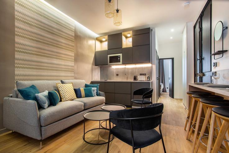 Elegantly designed living room with modern furnishings in an apartment at Building Rue du Faubourg Poissonnière - checkmyguest - 1350428 in 10th arrondissement, Paris