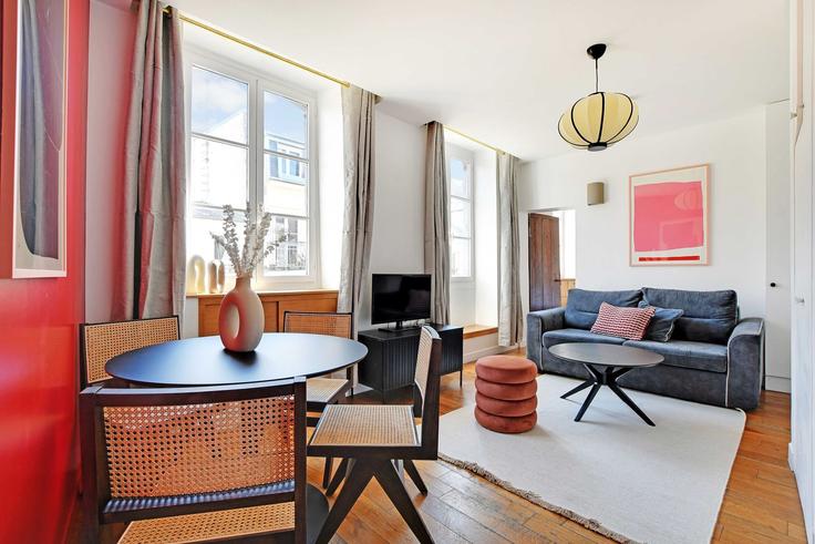 Elegantly designed living room with modern furnishings in an apartment at Building Rue Sainte-Croix de la Bretonnerie - checkmyguest - 1350786 in 3rd arrondissement, Paris Elegantly designed living room with modern furnishings in an apartment at Building Rue Sainte-Croix de la Bretonnerie - checkmyguest - 1350786 in 3rd arrondissement, Paris