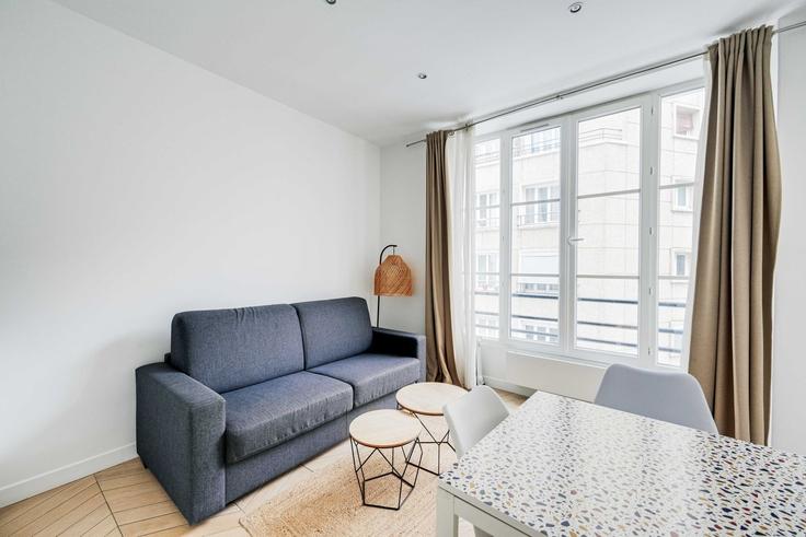 Elegantly designed living room with modern furnishings in an apartment at Building Passage de la Main d'Or - checkmyguest - 1350917 in 11th arrondissement, Paris Elegantly designed living room with modern furnishings in an apartment at Building Passage de la Main d'Or - checkmyguest - 1350917 in 11th arrondissement, Paris
