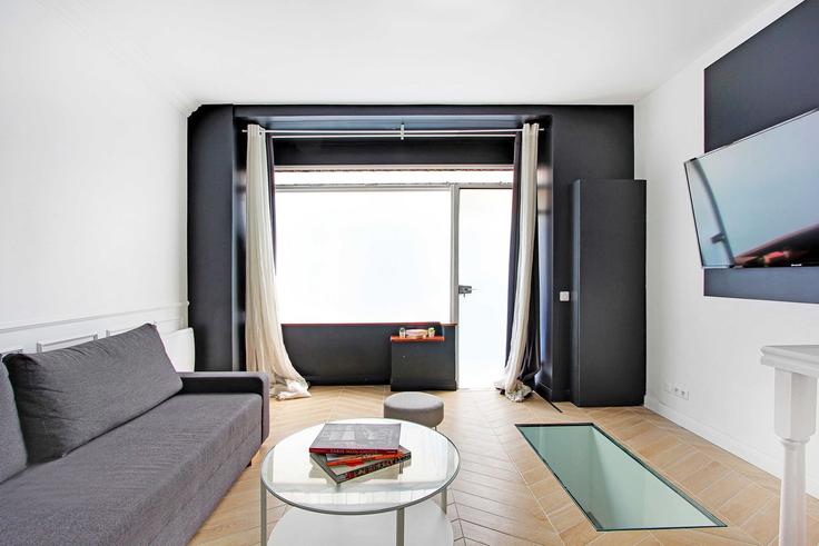Building Rue Pétion - checkmyguest - 1351065 adresindeki bir dairede modern mobilyalarla zarif bir şekilde tasarlanmış oturma odası 11th arrondissement, Paris