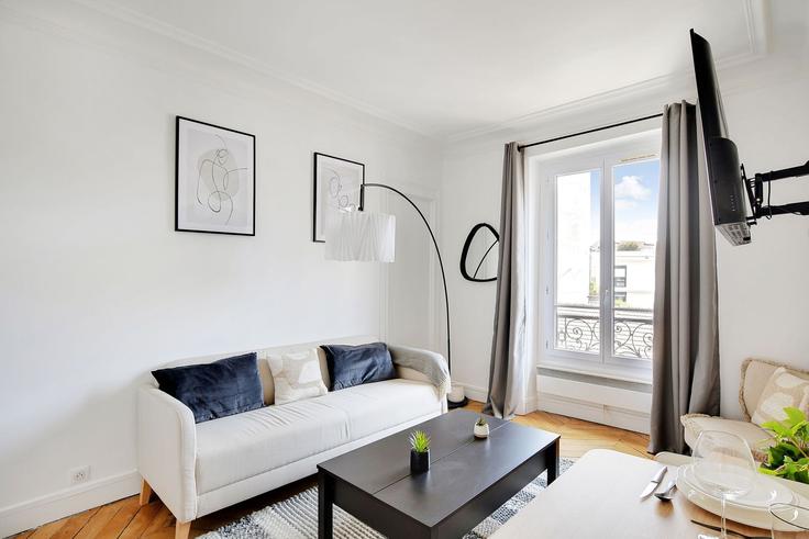 Elegante sala de estar con mobiliario moderno en un apartamento en Building Boulevard Voltaire - checkmyguest - 1351042 en 11th arrondissement, Paris Elegante sala de estar con mobiliario moderno en un apartamento en Building Boulevard Voltaire - checkmyguest - 1351042 en 11th arrondissement, Paris