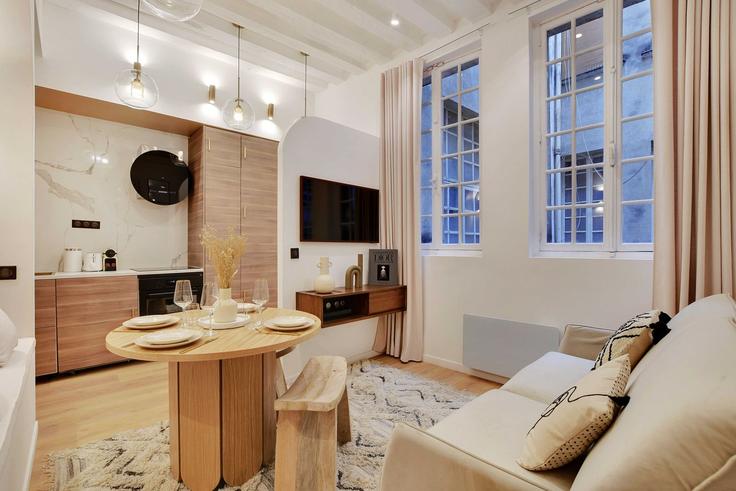 Elegantly designed living room with modern furnishings in an apartment at Building Rue Saint-Martin - checkmyguest - 1350447 in 3rd arrondissement, Paris