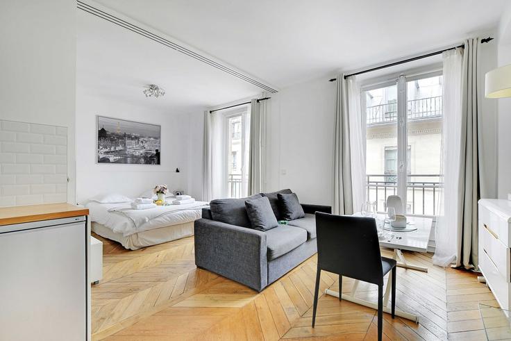 Elegantly designed living room with modern furnishings in an apartment at Building Rue Volney - checkmyguest - 1350970 in 2nd arrondissement, Paris