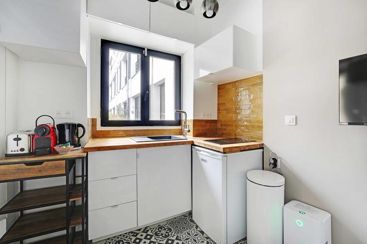 Cozinha funcional e elegante com equipamentos de última geração em apartamento de alto padrão no Building Rue Amelot - checkmyguest - 1350683 em 11th arrondissement, Paris Cozinha funcional e elegante com equipamentos de última geração em apartamento de alto padrão no Building Rue Amelot - checkmyguest - 1350683 em 11th arrondissement, Paris
