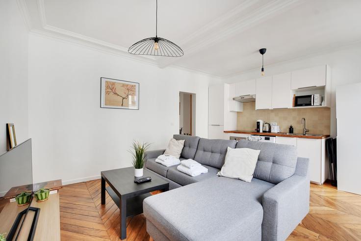 Building Rue des Petites Écuries - checkmyguest - 1052439 - PAR adresindeki bir dairede modern mobilyalarla zarif bir şekilde tasarlanmış oturma odası 10th arrondissement, Paris Building Rue des Petites Écuries - checkmyguest - 1052439 - PAR adresindeki bir dairede modern mobilyalarla zarif bir şekilde tasarlanmış oturma odası 10th arrondissement, Paris