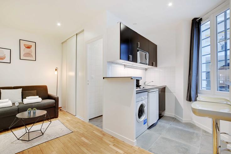 Cocina funcional y elegante con equipamiento de alta gama en un apartamento de lujo en Building Rue de Charonne - checkmyguest - 1052679 en 11th arrondissement, Paris