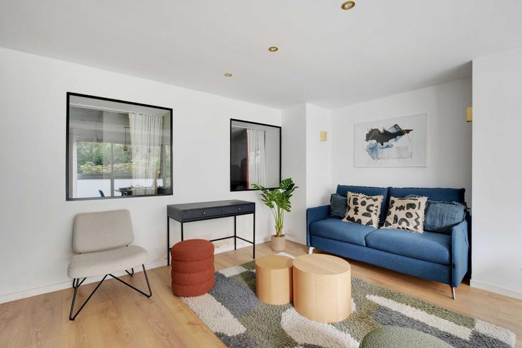 12th arrondissement, Paris에 위치한 Building Cours de Vincennes - checkmyguest - 1351060 유닛의 세련된 인테리어가 돋보이는 거실 12th arrondissement, Paris에 위치한 Building Cours de Vincennes - checkmyguest - 1351060 유닛의 세련된 인테리어가 돋보이는 거실