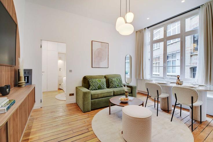 Elegantly designed living room with modern furnishings in an apartment at Building Cité de Magenta - checkmyguest - 1350525 in 10th arrondissement, Paris