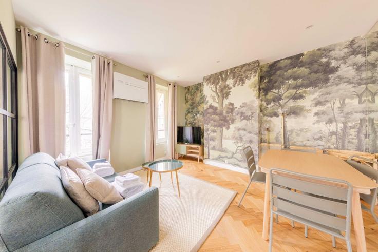 Elegante sala de estar con mobiliario moderno en un apartamento en Building Rue Pierre Leroux - checkmyguest - 1348022 en 7th arrondissement, Paris Elegante sala de estar con mobiliario moderno en un apartamento en Building Rue Pierre Leroux - checkmyguest - 1348022 en 7th arrondissement, Paris