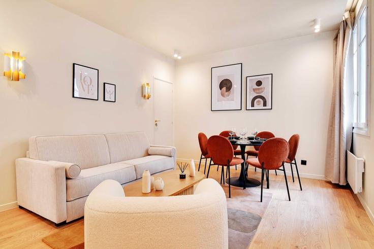 Paris 9th arrondissementのBuilding Rue de la Grange Batelière - checkmyguest - 1350510のアパートメントにある、モダンな家具を備えたエレガントなデザインのリビングルーム Paris 9th arrondissementのBuilding Rue de la Grange Batelière - checkmyguest - 1350510のアパートメントにある、モダンな家具を備えたエレガントなデザインのリビングルーム