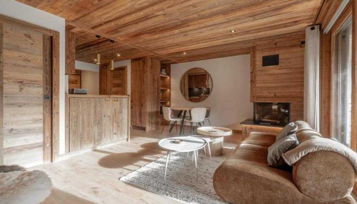 Megève MegèveのBuilding Chemin des Raverots - checkmyguest - 1347961のアパートメントにある、モダンな家具を備えたエレガントなデザインのリビングルーム