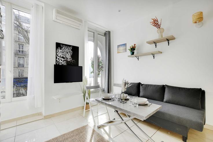 Elegantly designed living room with modern furnishings in an apartment at Building Boulevard de Strasbourg - checkmyguest - 1350860 in 10th arrondissement, Paris