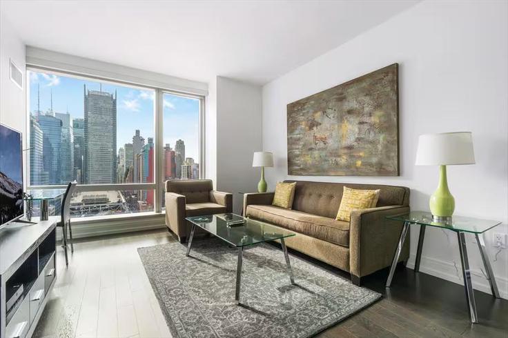 New York ManhattanのBuilding 10th Avenue - churchillliving - 1343795のアパートメントにある、モダンな家具を備えたエレガントなデザインのリビングルーム New York ManhattanのBuilding 10th Avenue - churchillliving - 1343795のアパートメントにある、モダンな家具を備えたエレガントなデザインのリビングルーム