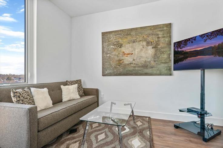 Elegante sala de estar con mobiliario moderno en un apartamento en Building Bank Street - churchillliving - 1039858 - NYC en White Plains, White Plains Elegante sala de estar con mobiliario moderno en un apartamento en Building Bank Street - churchillliving - 1039858 - NYC en White Plains, White Plains