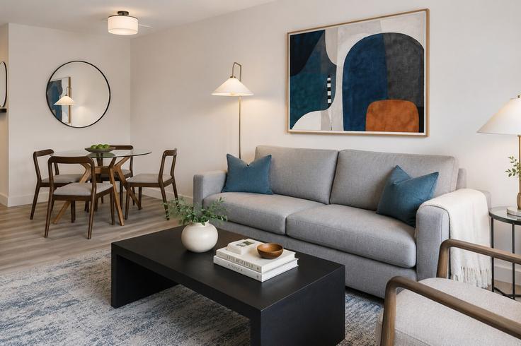 Sala de estar elegantemente projetada com móveis modernos em um apartamento no Building 30th Street Northwest - churchillliving - 1562772 em Washington, Washington Sala de estar elegantemente projetada com móveis modernos em um apartamento no Building 30th Street Northwest - churchillliving - 1562772 em Washington, Washington